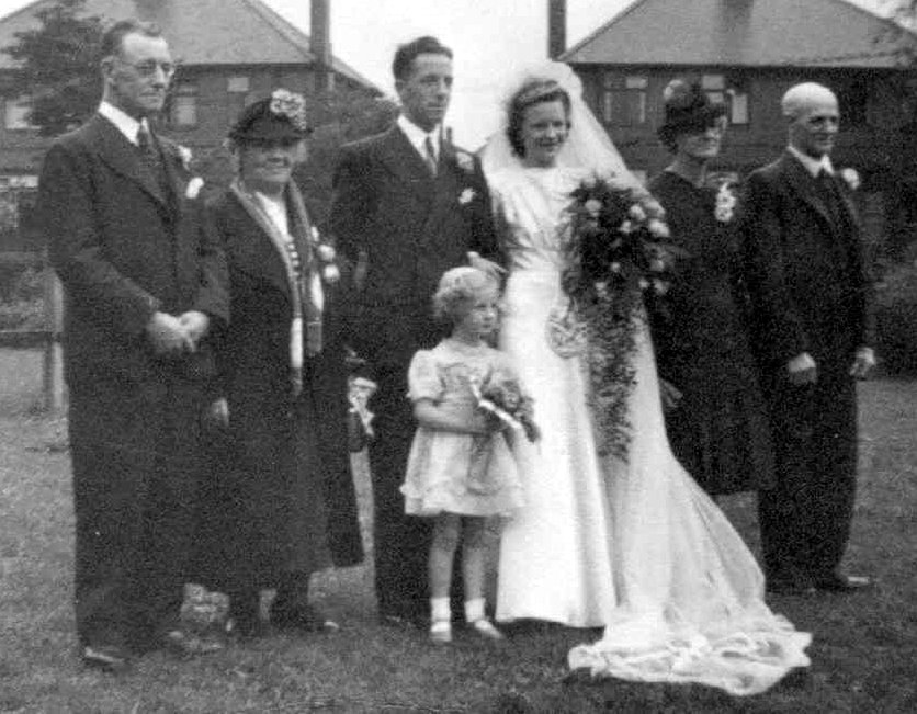 L-R: Frederick Petter, JUlia Petter, Jack Petter, bridesmaid Norma, Betty Abbott, Lizzie Abbott, Jim Abbott, 1946